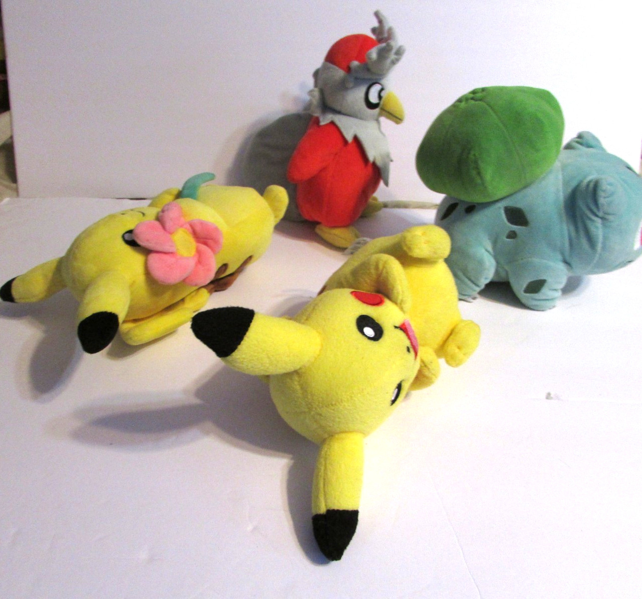 Lot Of 4 Pokemon Plush Pikachu W/Flower Delibird Bulbasaur
