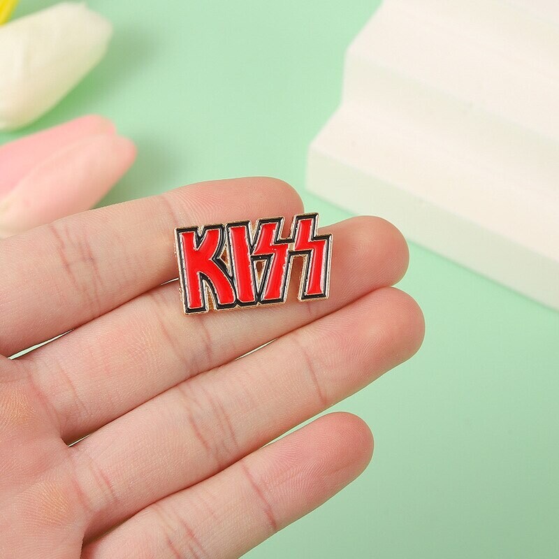 AMERICAN ROCK BAND "KISS" LAPEL PIN...