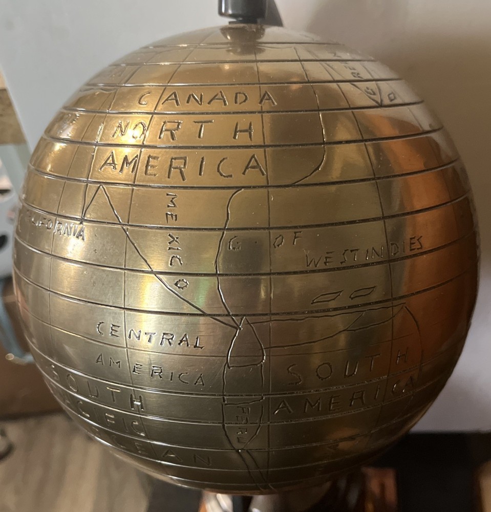 Bains Kushnick Clock Globe