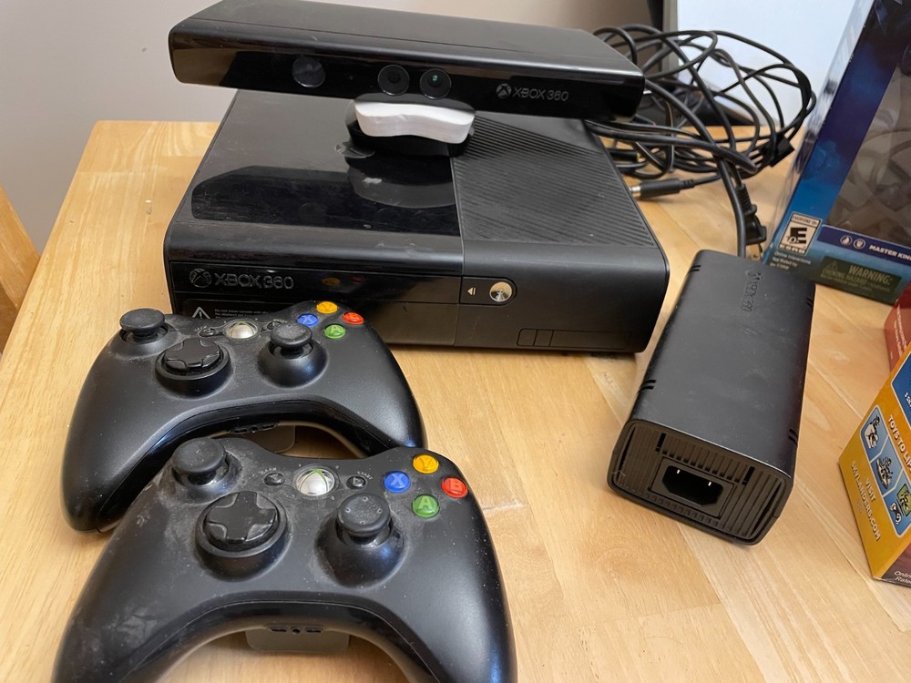 XBox 360 player with kinect sensor bar,  4 complete starter pack sets, PLUS