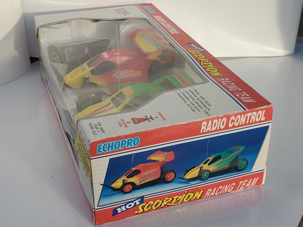 Vtg 1993 Echopro Radio Controlled Scorpion Racing Set. Missing one controller