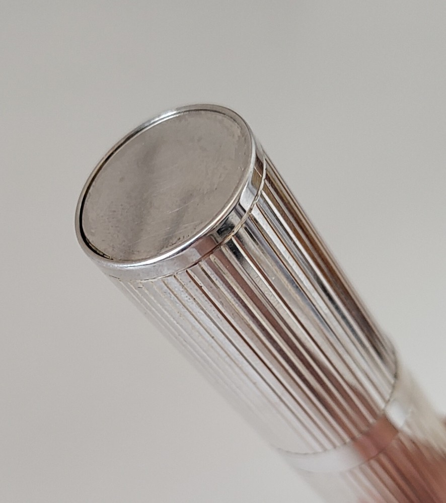 Perfume holder + makeup brush  