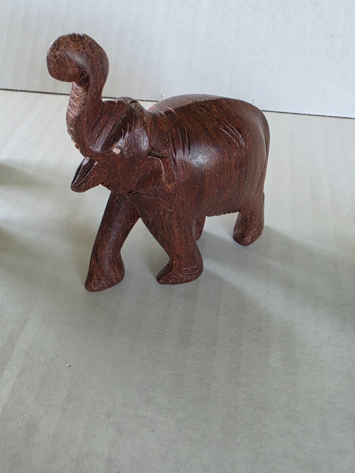 Three elephant figurines