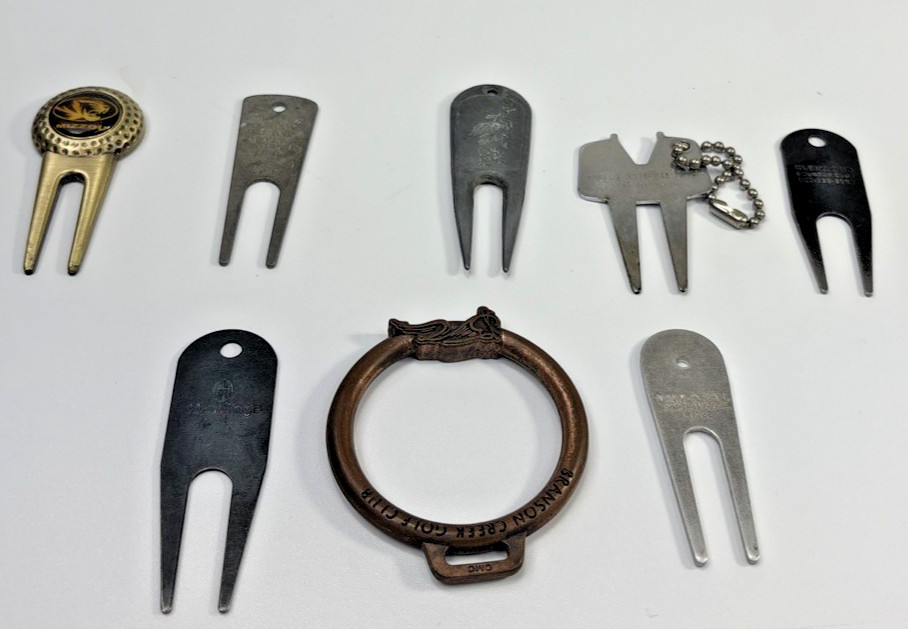 7 Golf Divot Tools And 1 Bag Tag
