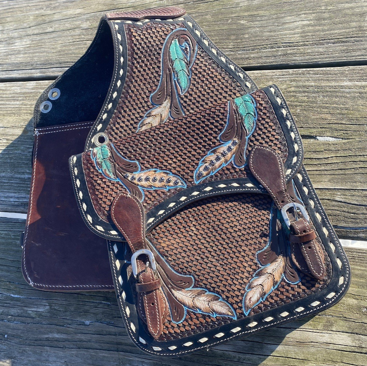 Basket tooled brown leather Western saddle bags with/hand painted feathers