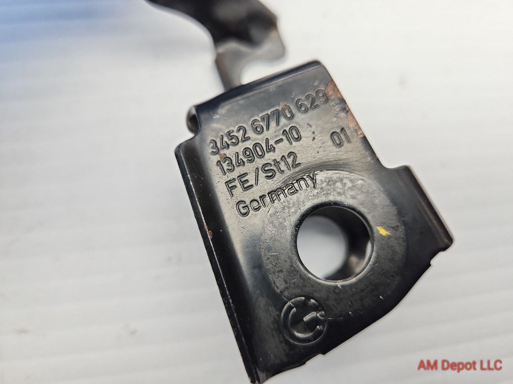 2009 BMW 135i 128i E82 E88 Front Left ABS Sensor Cable Holder / Bracket 6770629