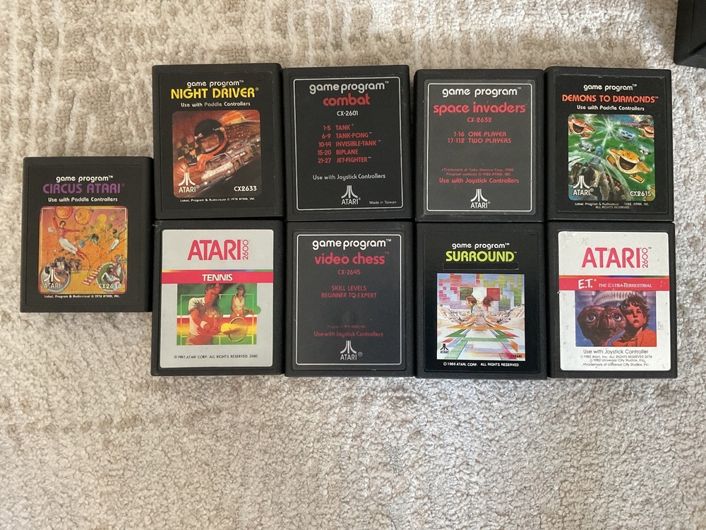 Atari 2600 bundle, games, cables, console, and controllers MAYBE WORKING - black