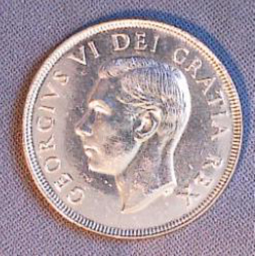 Canada 1950 Silver Dollar.