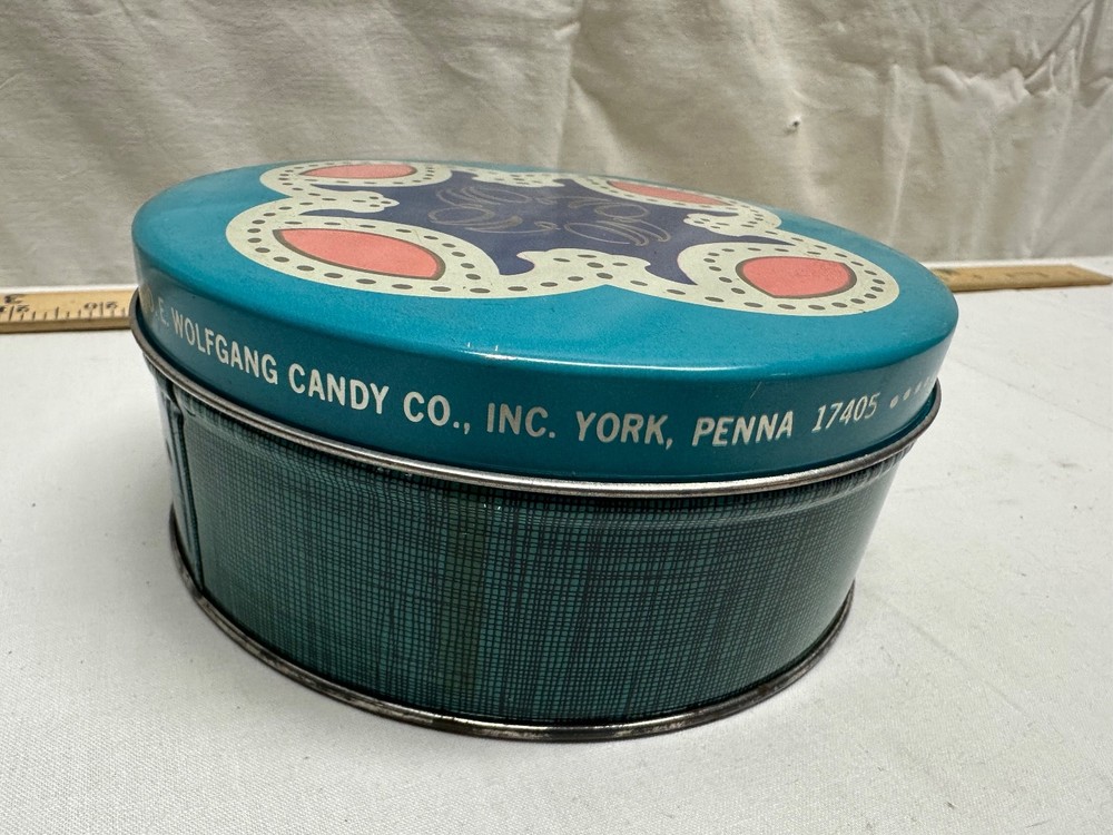D. E. Wolfgang Candy Tin - 6 inch round