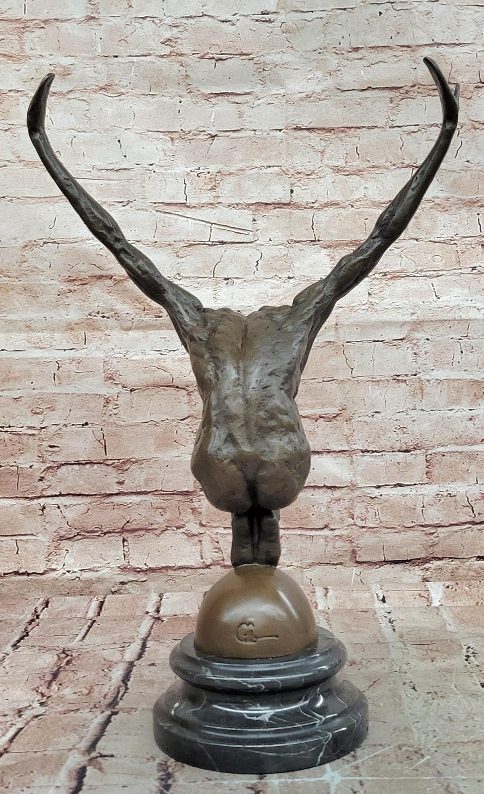 Abstract Bronze Male Figure Balancing on Sphere with Outstretched Arms Sculpture