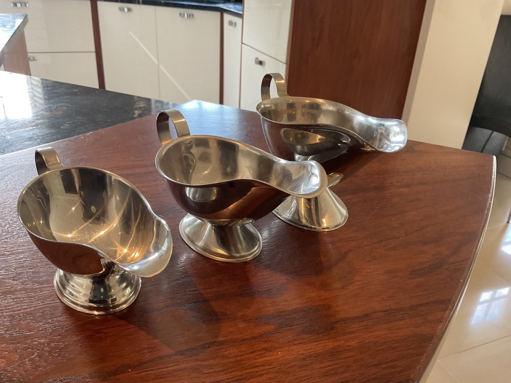 THREE SILVER COLOUR SAUCE BOATS GRADUATED