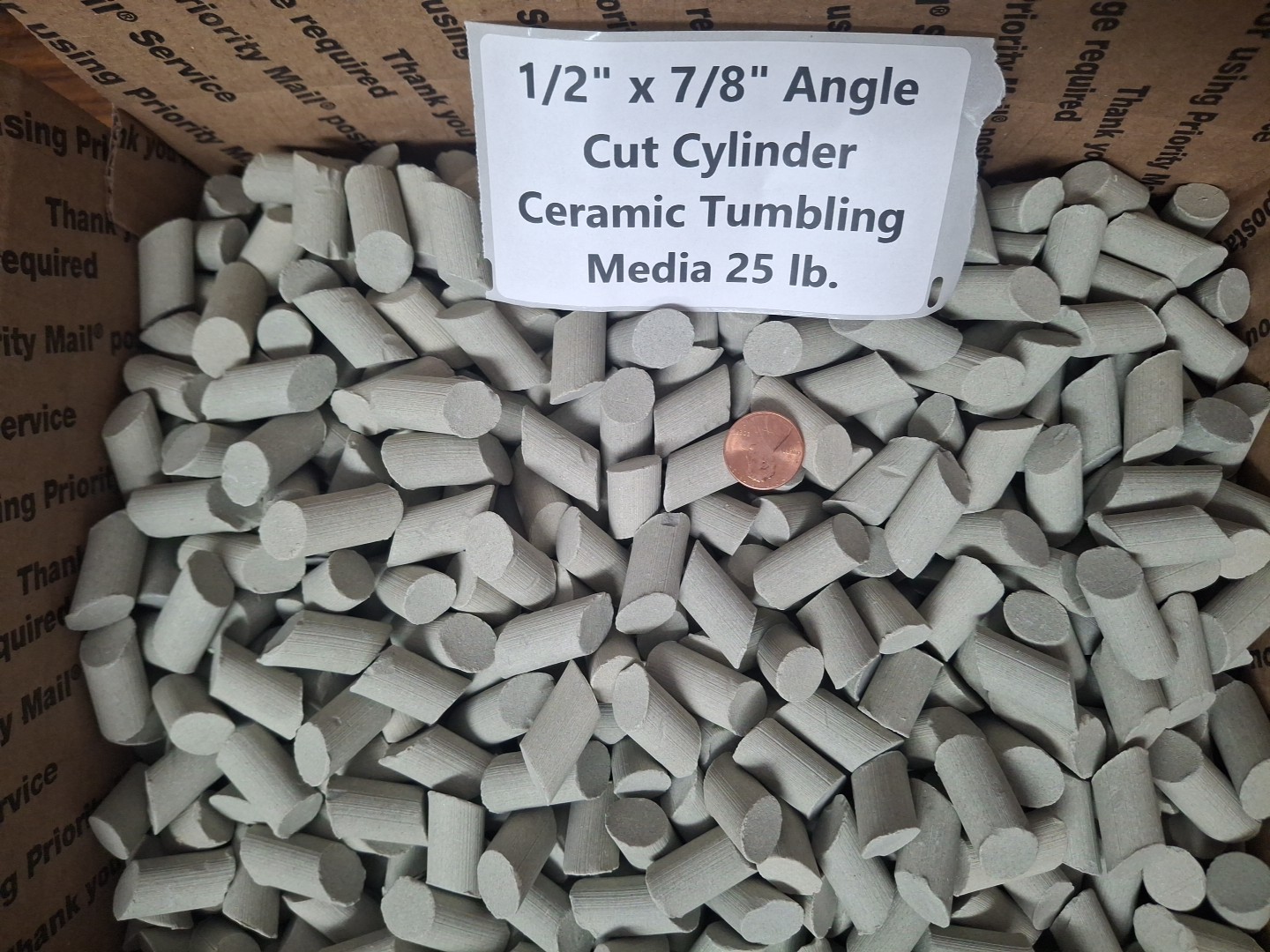 1/2" x 7/8" Angle Cut Cylinder Abrasive Ceramic Tumbling Media - 25 lb.