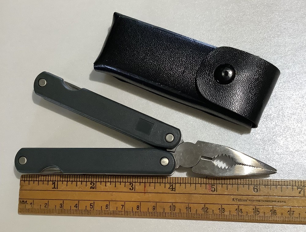 SALE $8 Multitool 8 Function Black Handle Not Branded In Case