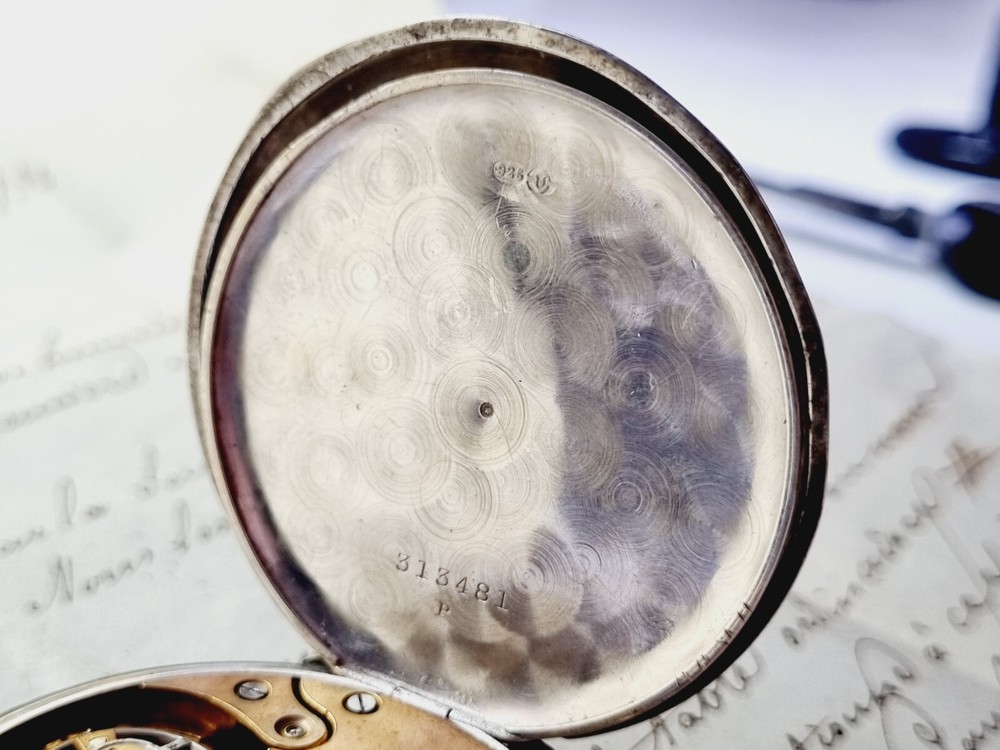 silver open face pocket watch