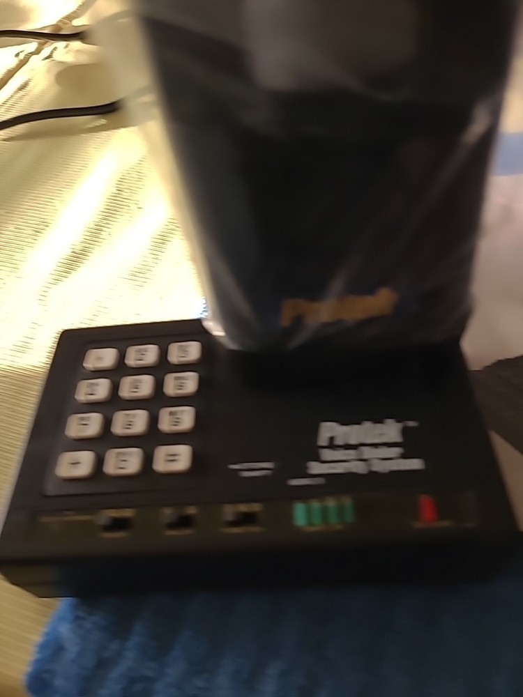 PROTEK VOICE DIALER SECURITY SYSTEM