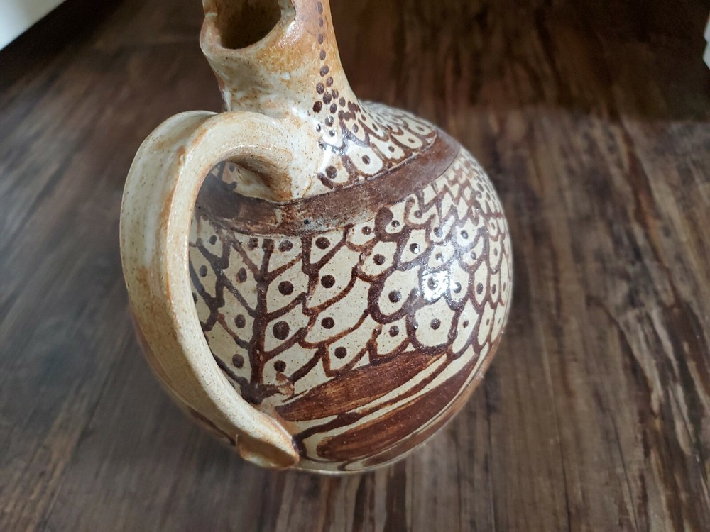 Amazing Pottery Pitcher Signed SF
