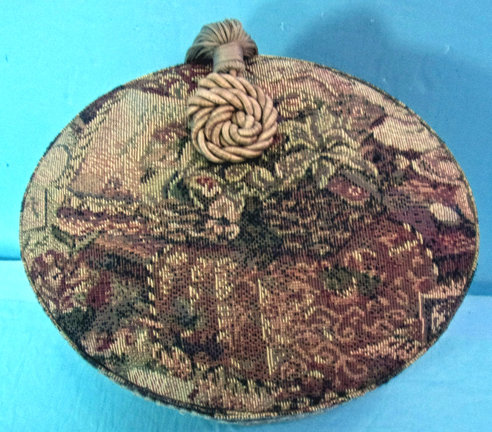 TAPESTRY CLOTH FABRIC COVERED OVAL STORAGE BOX w/PADDED LID & TASSEL