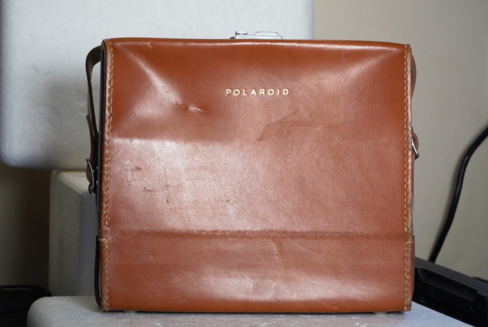 Polaroid Land Camera Model 8oA Wink Light Light Reducer &  leather case