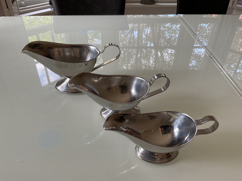 THREE SILVER COLOUR SAUCE BOATS GRADUATED