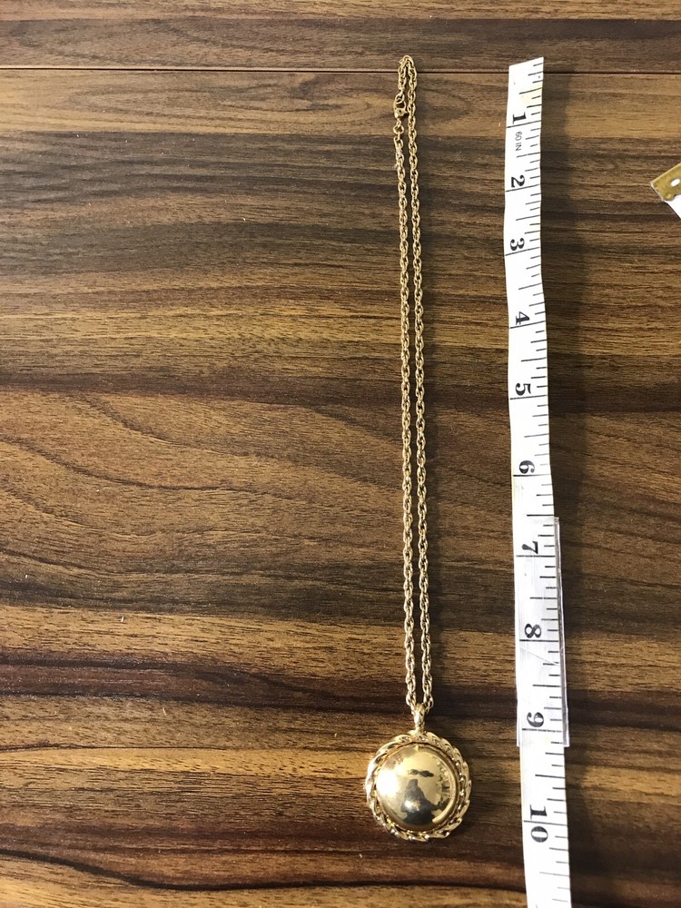 Monet Gold tone Necklace with round Pattern Pendant