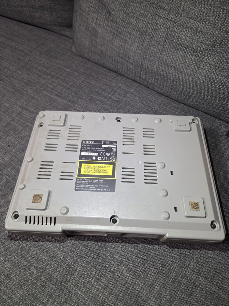 PS1 SCPH-9002 + Cables + Game (No Controller)