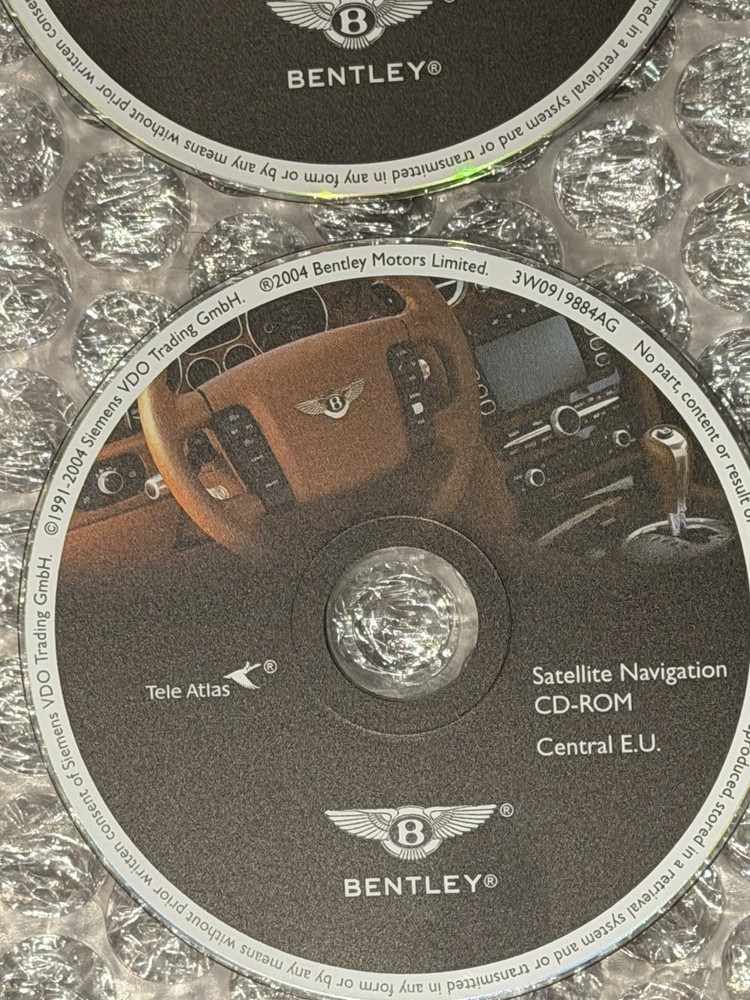 2004 Bentley Continental GT 7 Navigation Disc Set & Bentley Disc Case.