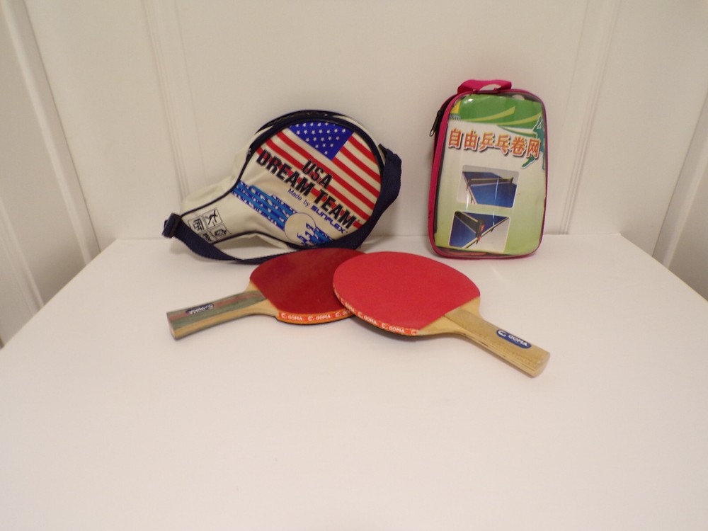 Two double layer table tennis rackets  in a case with net for play