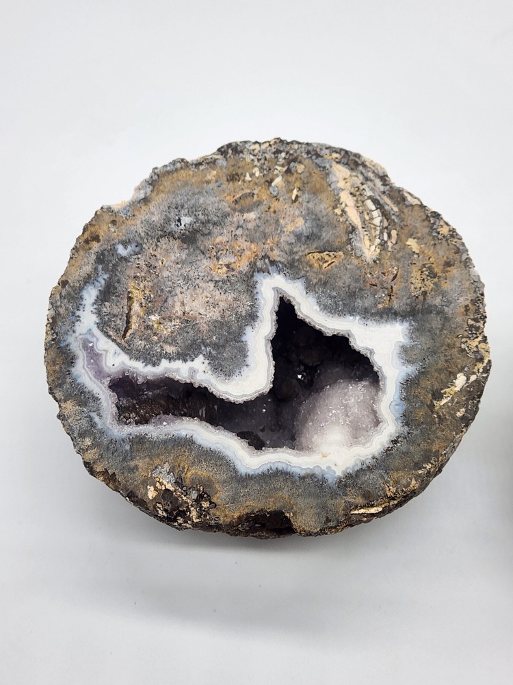 2 Light amethyst with calcite geode ~4" Diameter
