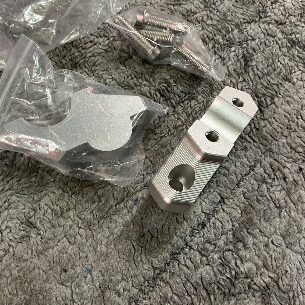 Motorcycle handlebar risers new unused