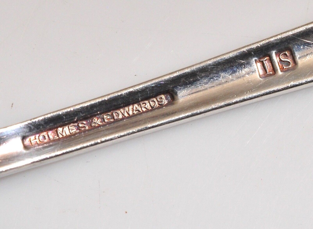 HOLMES EDWARDS ROMANCE SILVERPLATED SLOTTED SERVING SPOON - 8.5"