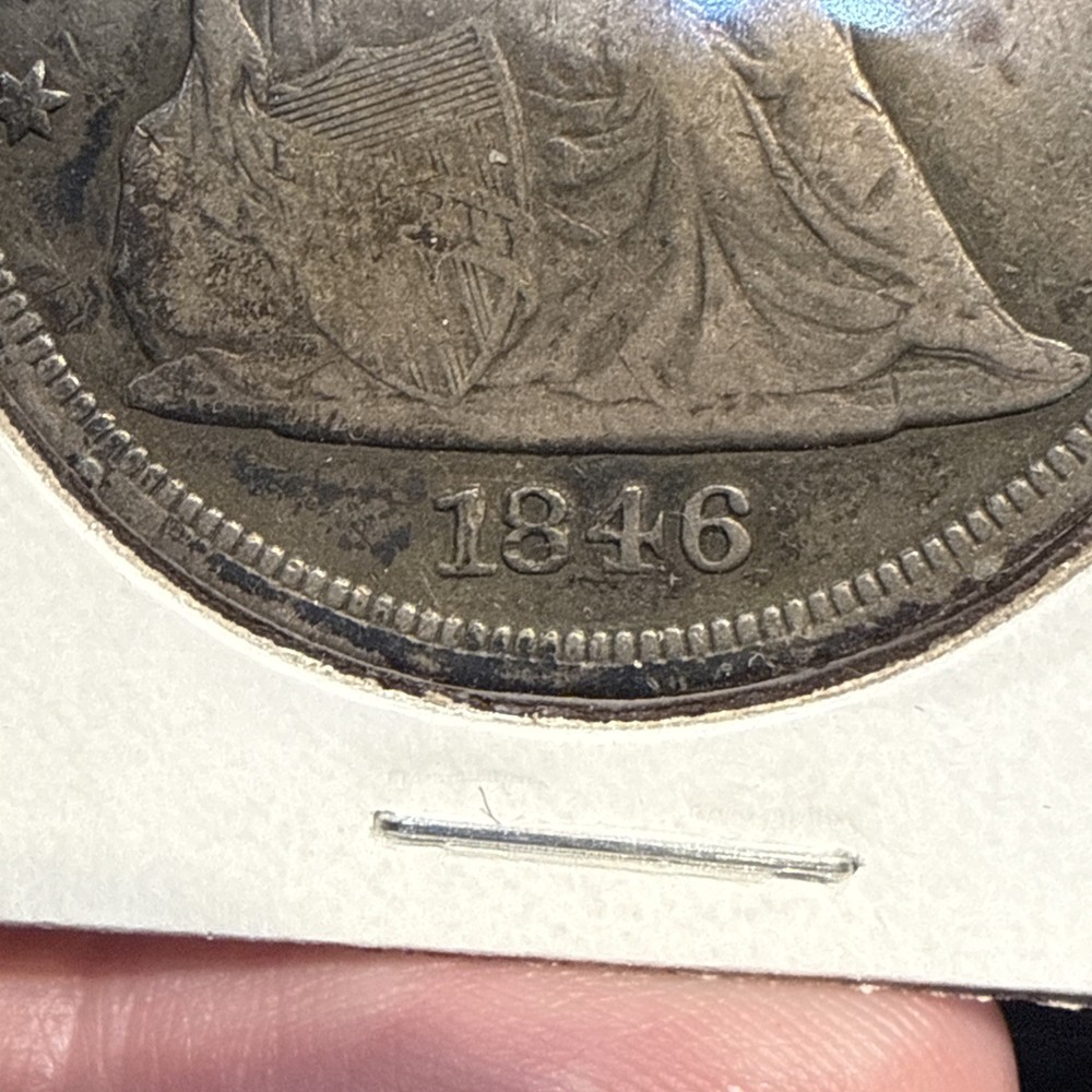 1846 Seated Liberty Dollar Holed.