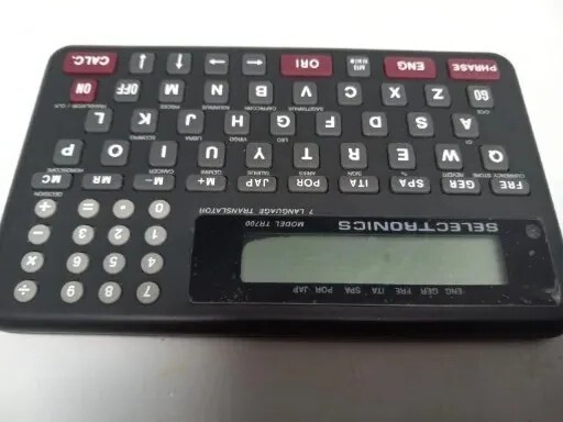 Selectronics 7 Language Translator Pocket Size Used Works