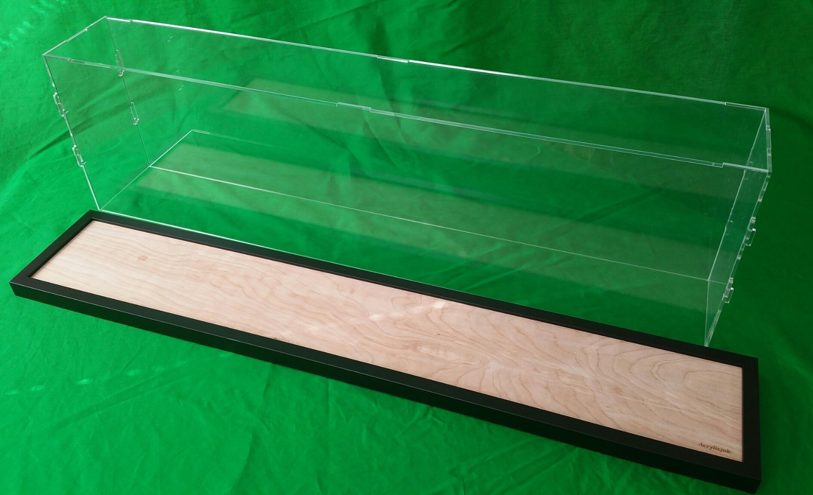 36"L x 10"W x 12"H Display case with 3/16" thick acrylic black wood frame base
