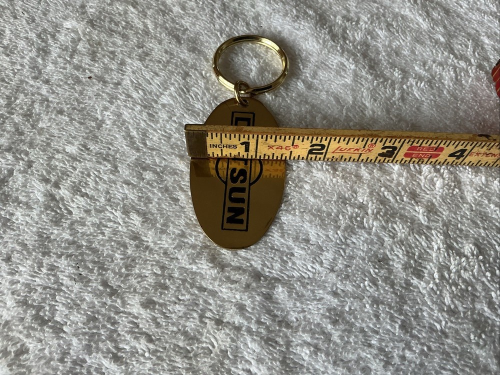 Brass Datsun Keychain, 2.5”x1.5” , Nice Shape