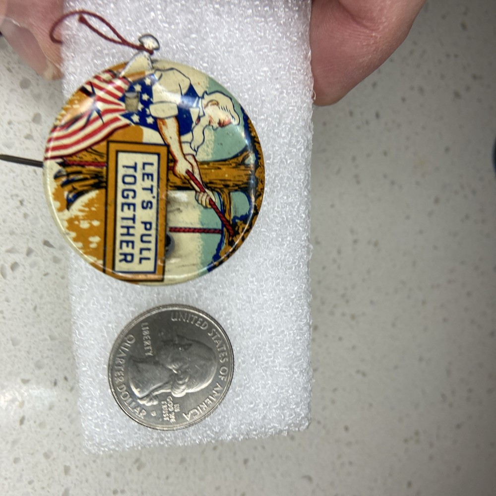 Vintage WWII Uncle Sam LET’S PULL TOGETHER Propaganda Mechanical Pinback Button