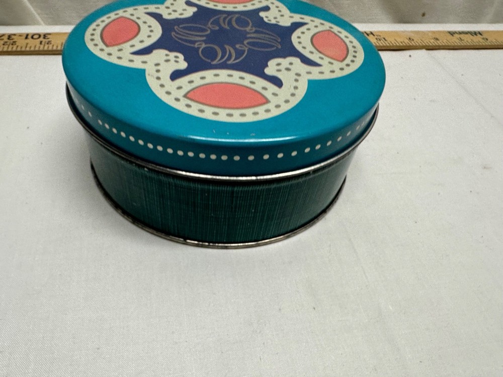 D. E. Wolfgang Candy Tin - 6 inch round