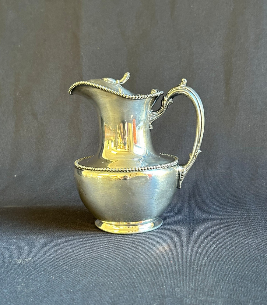 Superior Silver Co. Quadruple Plate Syrup Pitcher