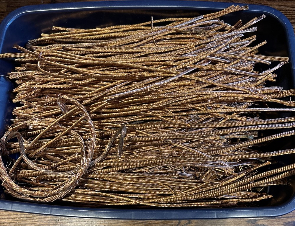 50 POUNDS BARE BRIGHT COPPER #1 STRIPPED BARE WIRE.