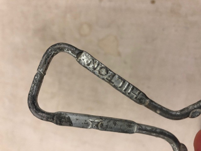 Hilton bottle opener