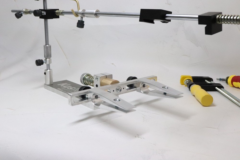 Knife sharpener system with KosiM swivel mechanism