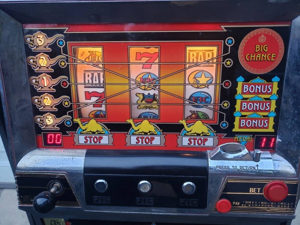TOKEN SLOT MACHINE ALADDIN 1995