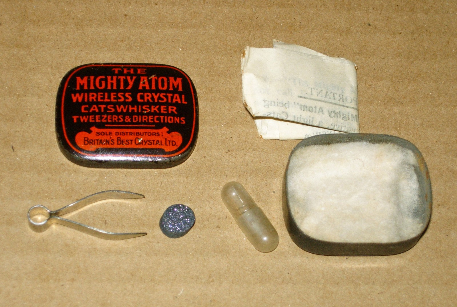 "MIGHTY ATOM" RADIO CRYSTAL WITH TIN, CATS WHISKER, TWEEZERS & INSTRUCTIONS (UK)