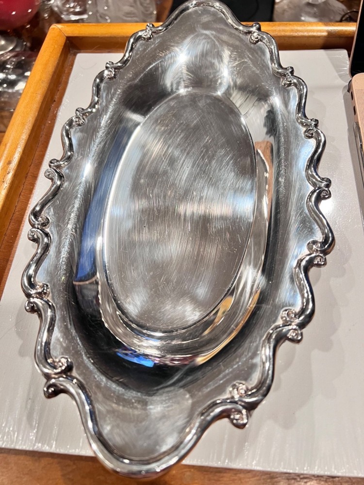 silver-plated seving tray with ornate border