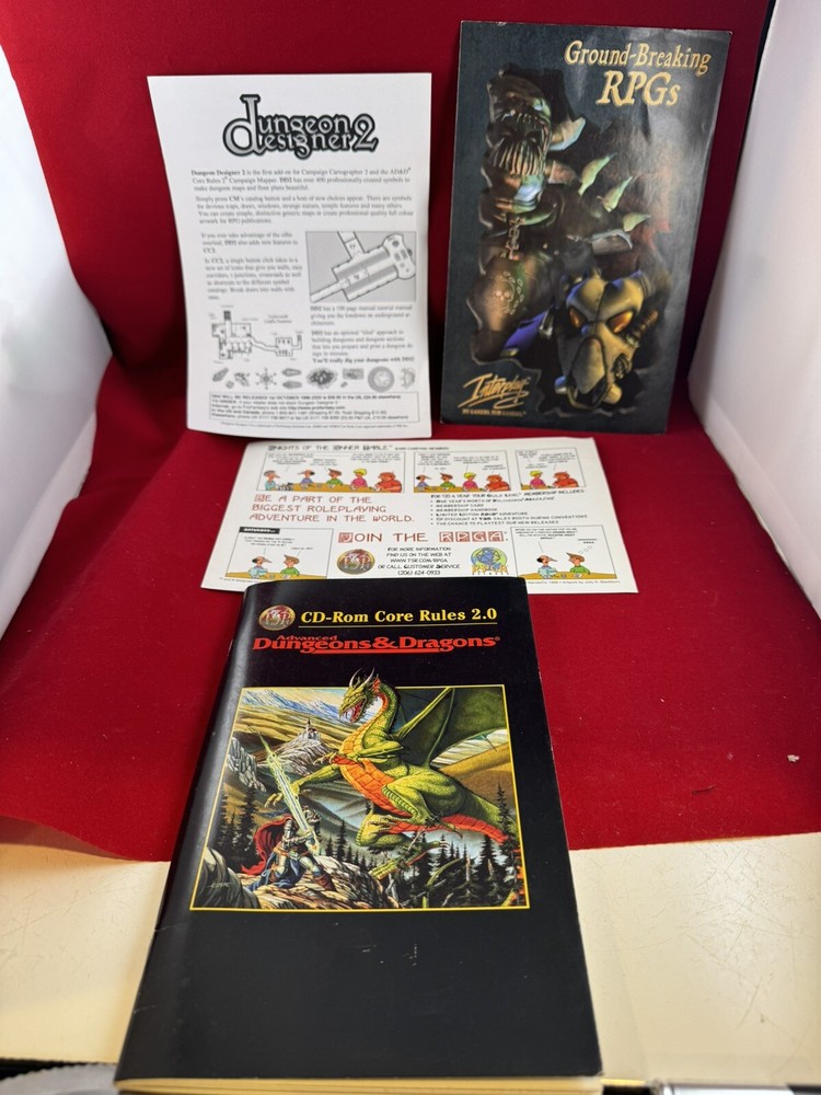 Advanced Dungeons & Dragons CD-Rom Core Rules 2.0 manual and paperwork.