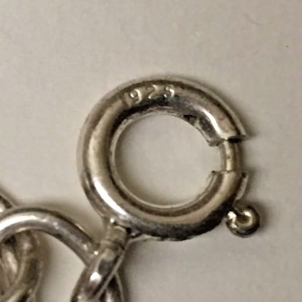 CHARM STERLING BRACLET 7 INCHES