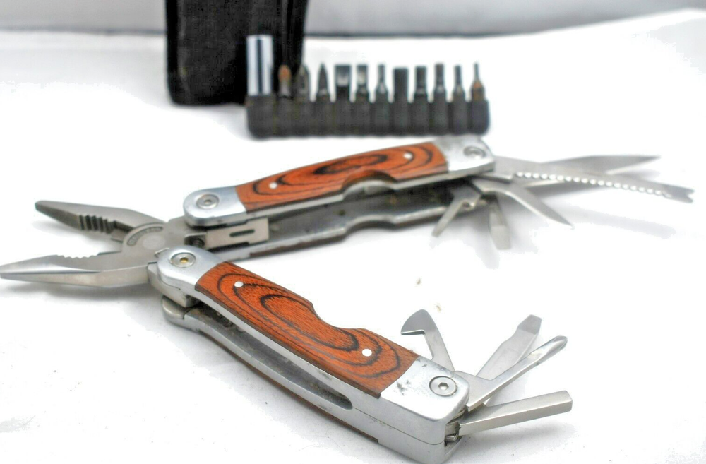 combination plier knife tool with 11 screwdriver type bits, and more about20uses