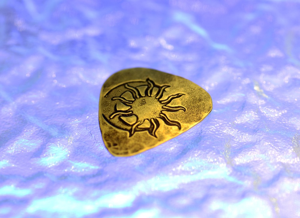 Sun and Moon playable brass guitar pick