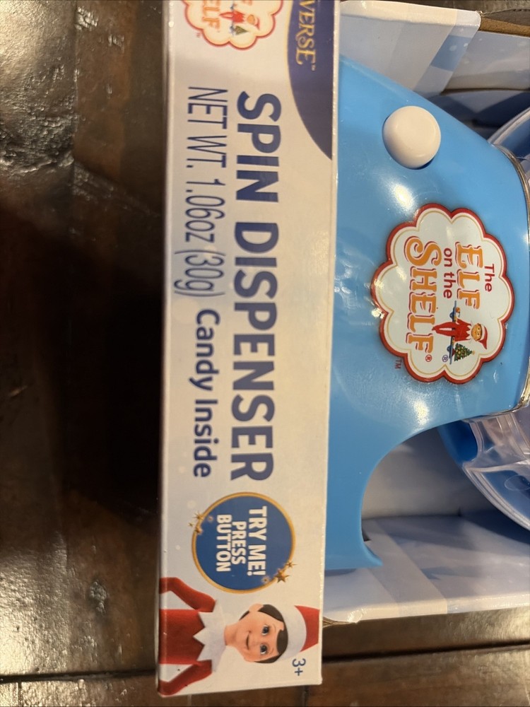 The Elf on the Shelf® Candy Spin Dispenser - candy inside