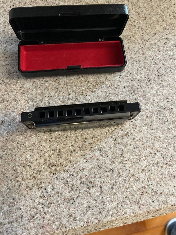 Neuma 10-Hole Blues Harmonica in a protective case