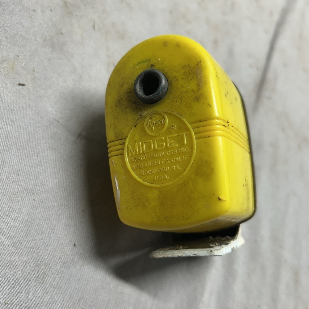 VINTAGE APSCO MIDGET YELLOW PENCIL SHARPENER
